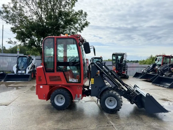 Телескопический мини погрузчик QUADTRAC WL30T
