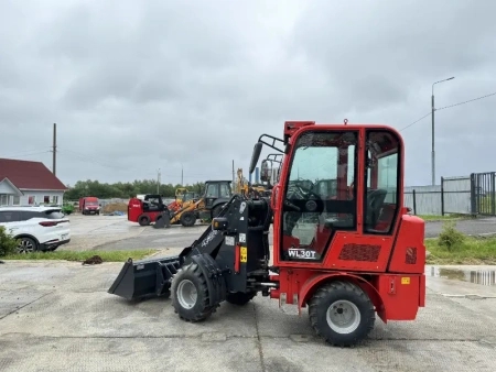 Телескопический мини погрузчик QUADTRAC WL30T