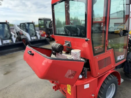 Телескопический мини погрузчик QUADTRAC WL30T