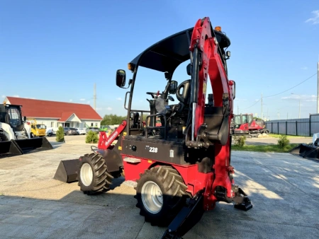 Мини-экскаватор-погрузчик QUADTRAC XN228
