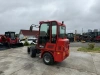 Телескопический мини погрузчик QUADTRAC WL30T